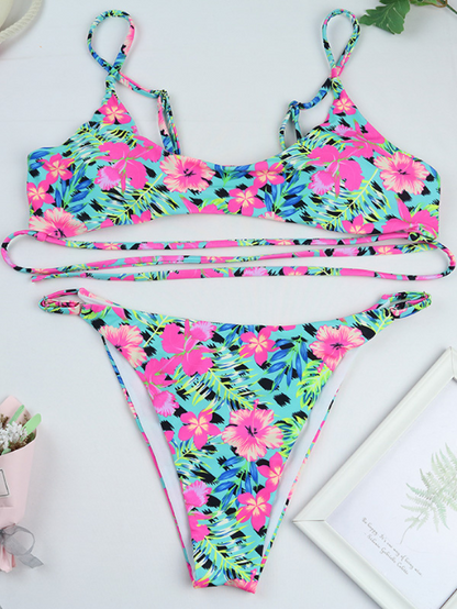 Bikini incrociato con fiori turchesi