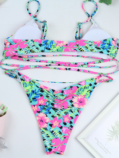 Bikini incrociato con fiori turchesi